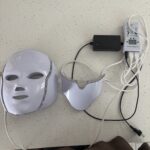 a red light therapy mask on counter