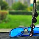 sunglasses and earplugs in car
