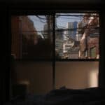 a dark bedroom in city