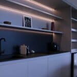 a kitchen with dimmable lighting