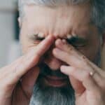 a man with head tension upclose