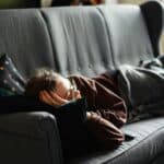 someone napping on couch