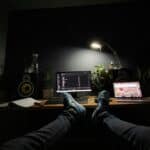 someone sitting at a computer desk