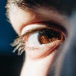a brown eye upclose looking