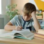a child studying book open