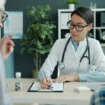 a doctor having a discussion with a couple
