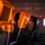 group of people on a flight commercial