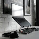 a laptop stand on a desk