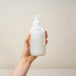 someone holding magnesium lotion