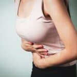 woman having a stomach cramp