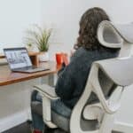 a woman sitting in an office chair