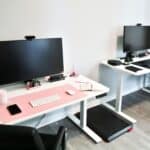 a desk setup under treadmill