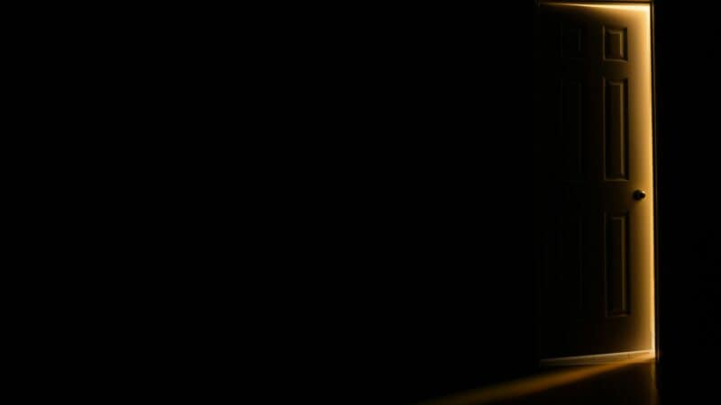 Best Door Light Blockers for a Dark Room in 2026: Seals, Sweeps, and Closing the Last Gap
